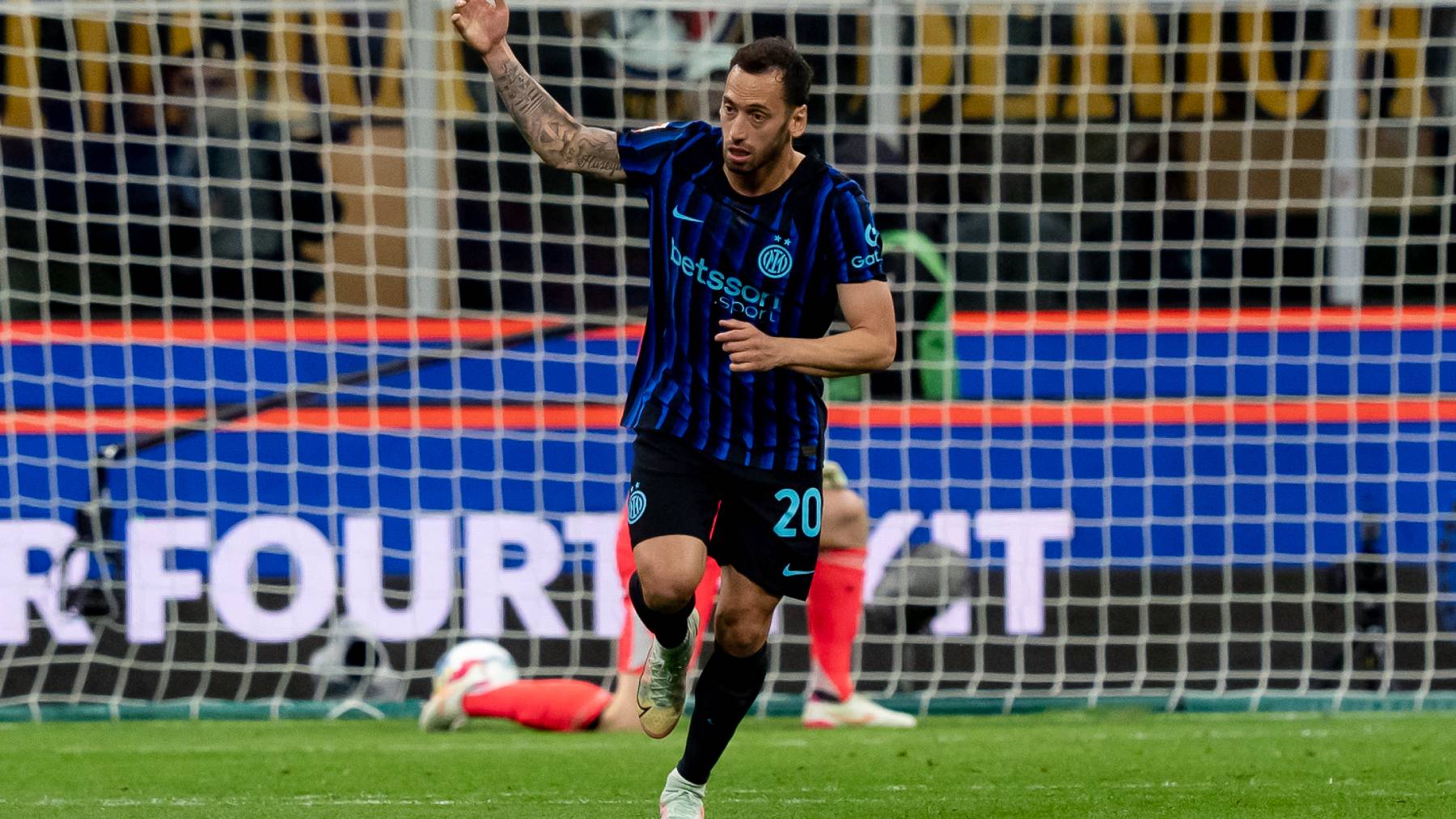 Hakan Calhanoglu of FC Internazionale celebrates after scoring first goal during the serie Coppa Italia Semi-Finals Second Leg match between FC Internazionale and Como 1907 at Stadio Giuseppe Meazza on April 21, 2026 in Milan, Italy (Photo by Giuseppe Maffia/NurPhoto)