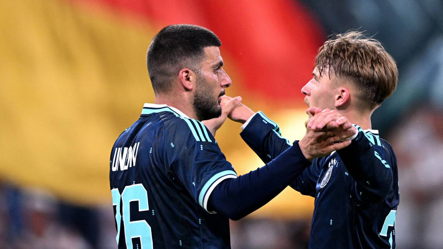 Germany's forward #26 Deniz Undav (L) celebrates scoring his team's third goal with Germany's midfielder #25 Lennart Karl during a friendly match between Germany and Finland ahead of the 2026 FIFA World Cup football tournament, in Mainz, western Germany on May 31, 2026.