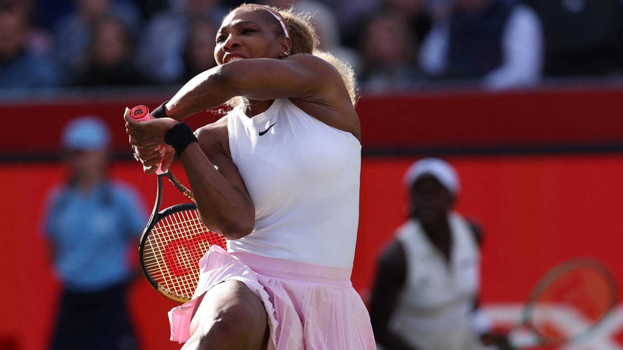 US player Serena Williams returns while playing with Canada's Victoria Mboko against US player Nicole Melichar-Martinez and New Zealand's Erin Routliffe during their round of 16, doubles match at the HSBC WTA tennis Championships at Queen's Club in west London on June 9, 2026.