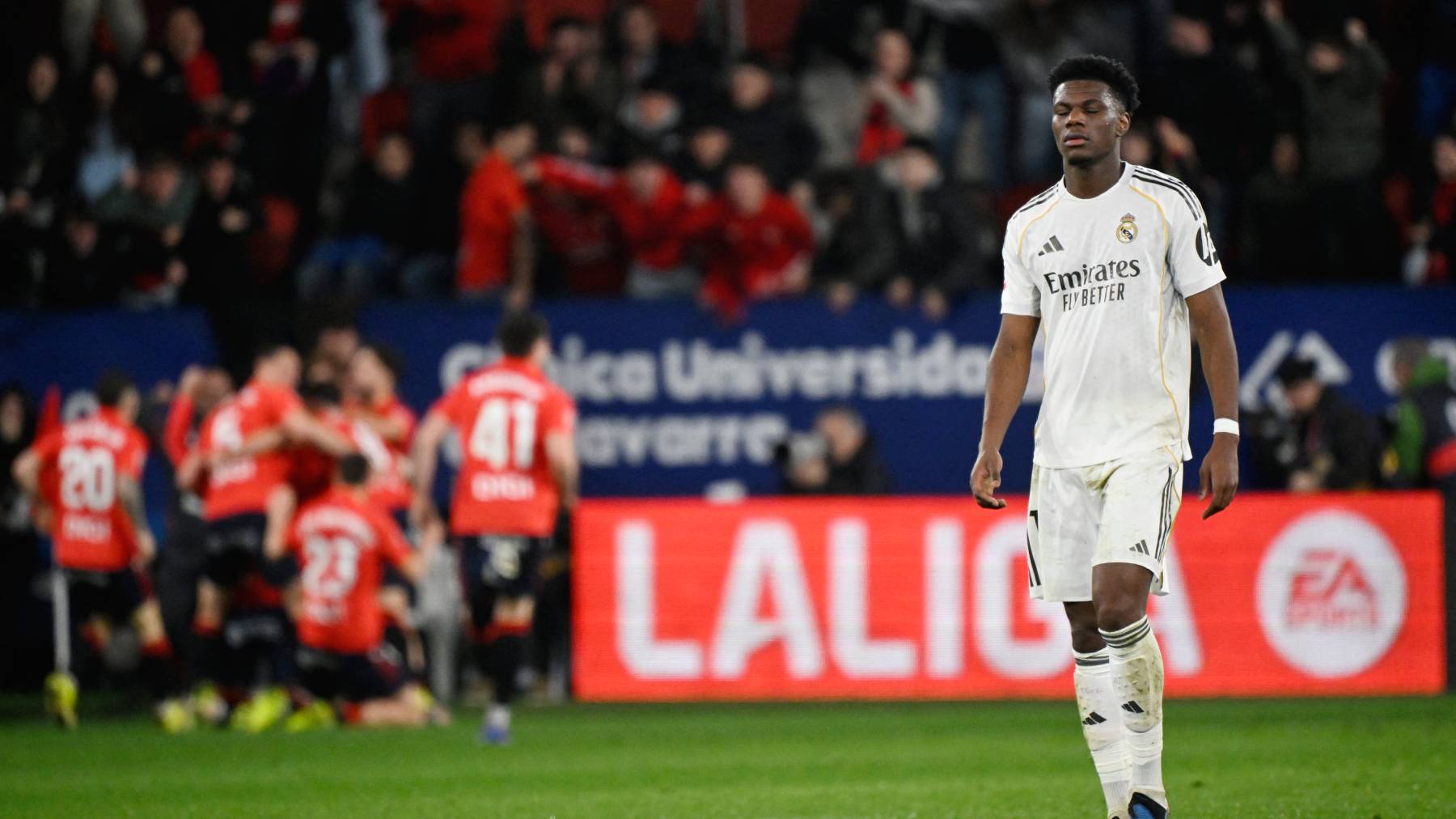 Real Madrid's French midfielder #14 Aurelien Tchouameni reacts to Osasuna's second goal scored by Spanish forward #09 Raul Garcia during the Spanish league football match between CA Osasuna and Real Madrid CF at El Sadar Stadium in Pamplona on February 21, 2026.